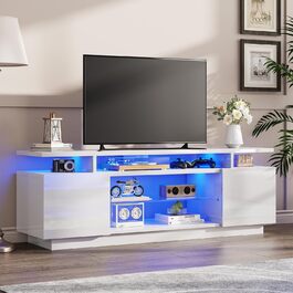 Тумба під TV Luxoak з LED підсвічуванням, білий глянцевий лак, 160x38.5x54.5 см. Підходить для телевізорів до 75 дюймів, з 2 дверцятами та регульованою скляною полицею. Для вітальні та спальні.