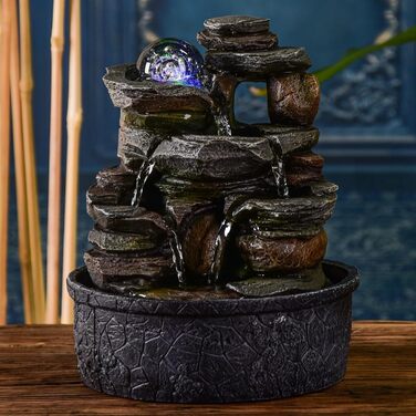 Джерело води Zen'Light від Zimmerbrunnen: природний водоспад з ефектом каменів та кольоровим LED-підсвічуванням. Ідеальна декор для дому, медитації та релаксації. Об'єкт Фен-Шуй для щастя. Висота 23 см (Satya)