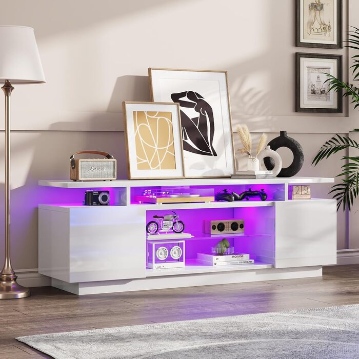 Тумба під TV Luxoak з LED підсвічуванням, білий глянцевий лак, 160x38.5x54.5 см. Підходить для телевізорів до 75 дюймів, з 2 дверцятами та регульованою скляною полицею. Для вітальні та спальні.