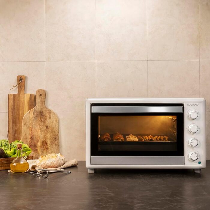 Конвекційна піч Cecotec 46 літрів Bake&Toast 4600 White Gyro. 2000 Вт, внутрішнє освітлення, 12 функцій, температура до 230°C, подвійне скло, з обертовим шампуром, білий