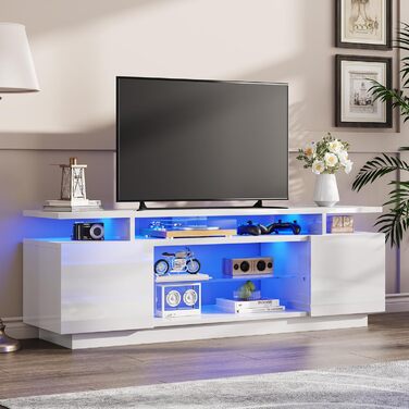 Тумба під TV Luxoak з LED підсвічуванням, білий глянцевий лак, 160x38.5x54.5 см. Підходить для телевізорів до 75 дюймів, з 2 дверцятами та регульованою скляною полицею. Для вітальні та спальні.