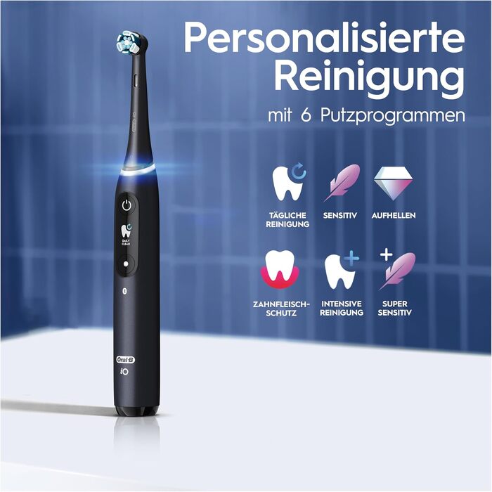 Електрична зубна щітка Oral-B iO Series 8 Plus Edition (набір 2 шт), 6 режимів чищення, 4 смінні насадки, дорожній кейс, чорний/фіолетовий