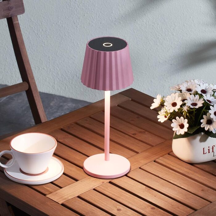 Lindby LED акумуляторна бездротова настільна лампа з датчиком дотику, рожева, IP54 (для внутрішнього та зовнішнього використання)