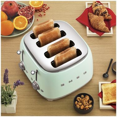 Тостер Smeg TSF03WHEU 4 відділення пастельно-зелений, 6 режимів, розморожування, підігрів, функція бейгл, 2000 Вт