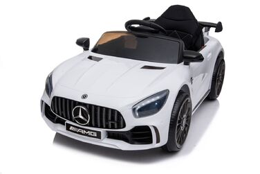 Дитячий електромобіль Mercedes GTR-S: м'які колеса EVA, шкіряне сидіння, білий колір, з пультом ДК