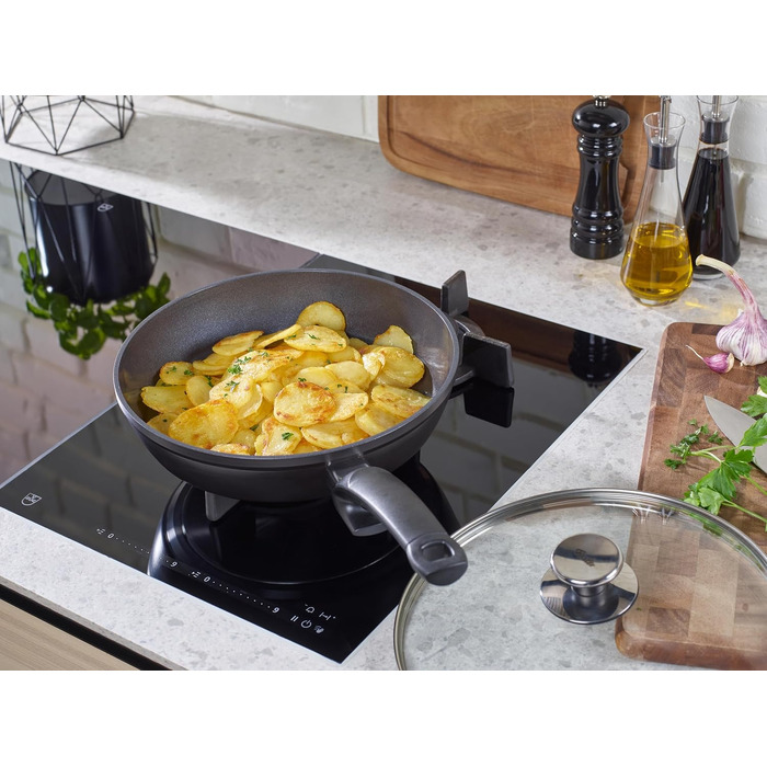 Набір сковорідок Fissler Ceratal Comfort & Classic, 4 предмети, керамічне покриття, для індукційних плит (24 та 28 см) з кришками, чорний