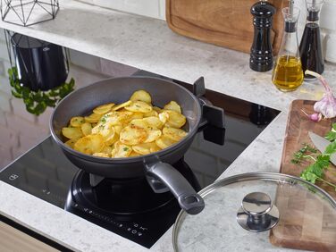 Набір сковорідок Fissler Ceratal Comfort & Classic, 4 предмети, керамічне покриття, для індукційних плит (24 та 28 см) з кришками, чорний